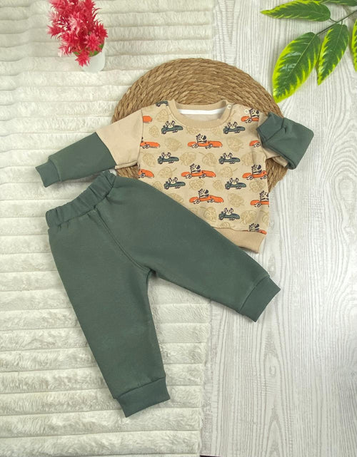 طقم شتوي ميلتون اولادي وبناتي مكون من قطعتين رسمة عربيه مبطن من الداخل🩷🤍